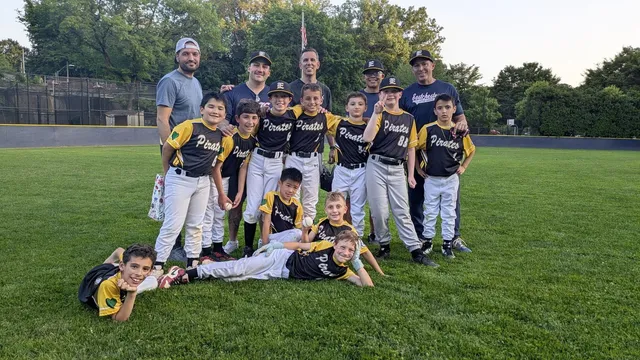 Biagio Maffettone coaching Pirates youth baseball squad