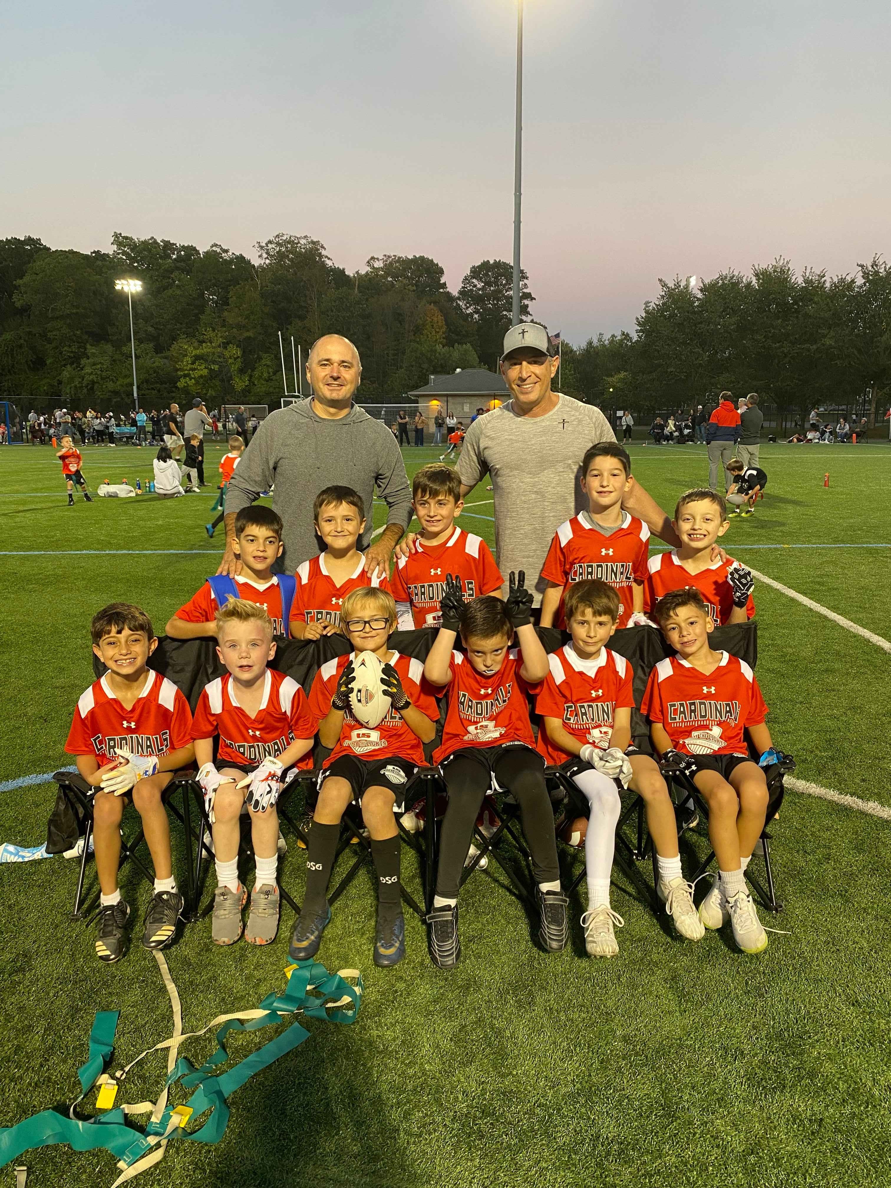 Biagio Maffettone with Cardinals kids football team.